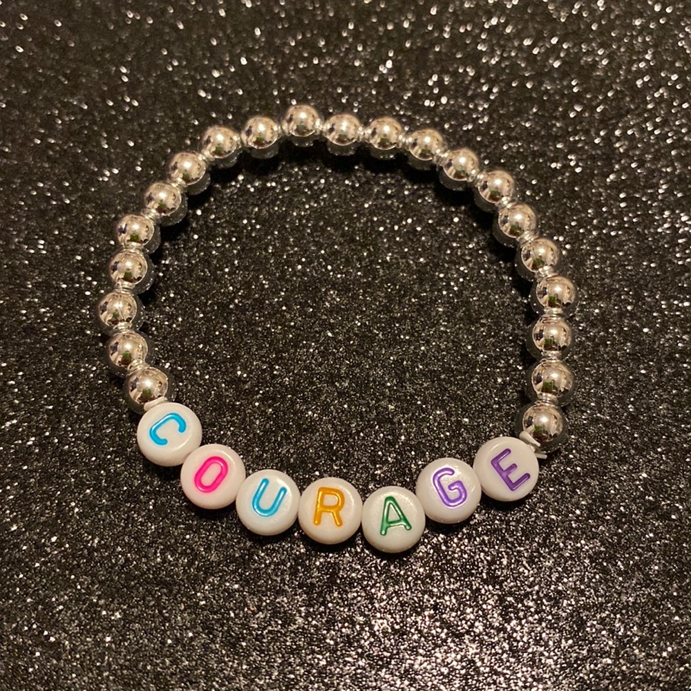 Girls faux silver beaded stretch courage bracelet
